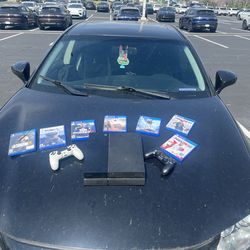 PS4 console and bundle with 2 controllers and games