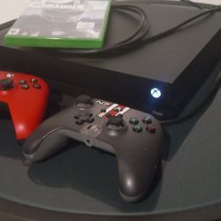 Xbox One X with 2 controllers
