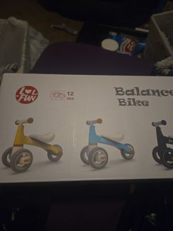 Yellow balance bike