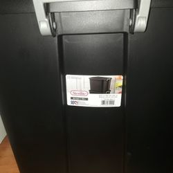 19 Black, plastic bins (tubs)