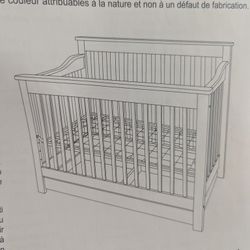 Delta White Wood Baby Crib with toddler conversion and storage drawer