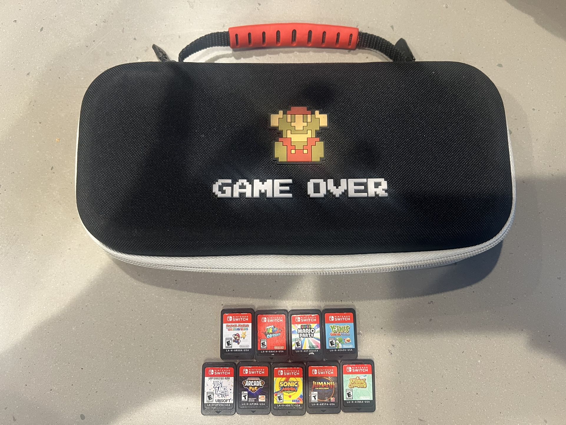 Nintendo Switch Game Bundle + Mario “Game Over” Carrying Case
