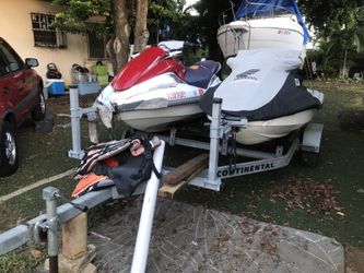 2005 yamaha fx cruiser and 2002 aquatrax plus trailer
