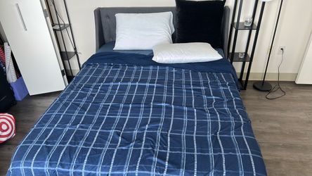 Mattress with bed frame and comforter set. Pillows not included