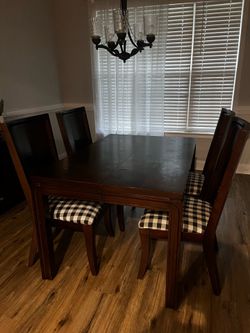 Formal dining table with 4 chairs