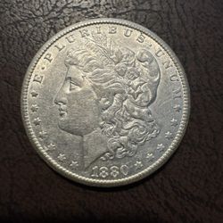 1880-CC Morgan Silver Dollar - Solid AU details key from the Carson City mint
