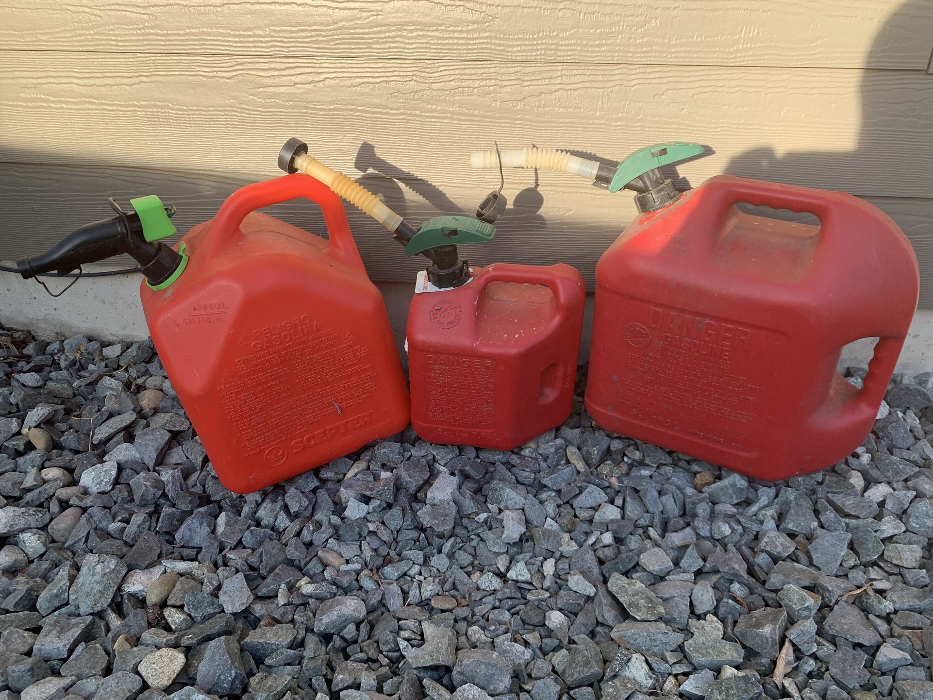 3 Gas Cans Total 2 Five Gallons And One 2 Gallon