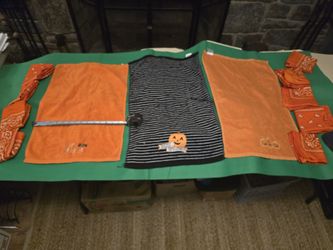 9 LARGE ORANGE HANKERCHIEFS/1 BLACK, AND TWO ORANGE TOWELS
