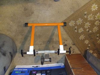 A stationary bike stand exerciser