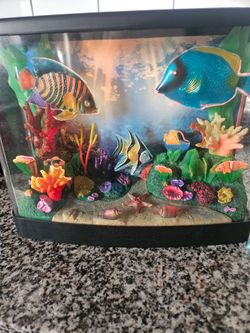 Lighted fake fish aquarium