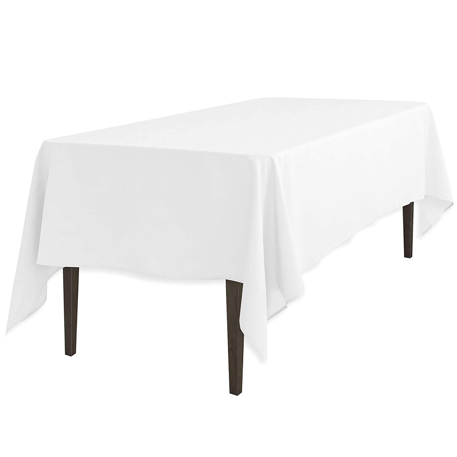 All white table cloths; wedding style
