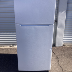 Frigidaire top-bottom refrigerator, white, in good, clean, and attractive condition. One month warranty. Delivery available. W30-D30-H66