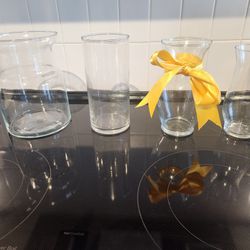 4 glass flower vases