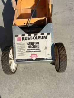 RUST-OLEUM STRIPING MACHINE