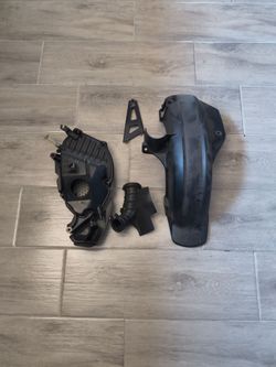 Honda navi 110 air intake box and fender