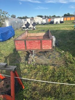 Small Utility Trailer with Wood Sides