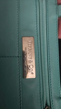 Tiffany & Co. turquoise leather tote/bucket-style handbag with a silver interior and removable pouch