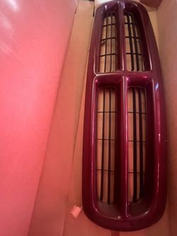 Dodge charger  grill and Chevrolet wheel center caps 