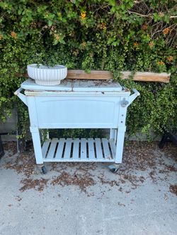 Rolling patio cooler ice chest cart