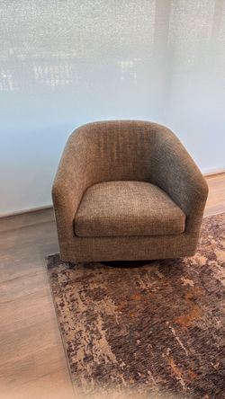 Grey tweed swivel chair