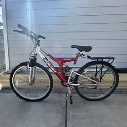 2 Magna Excitor Mountain Bikes