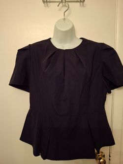 Short sleeve black  peplum top / blouse.