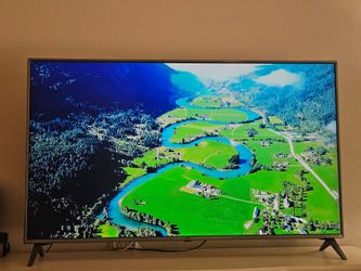LG 55” 4K Smart TV + FREE Dresser / TV Stand