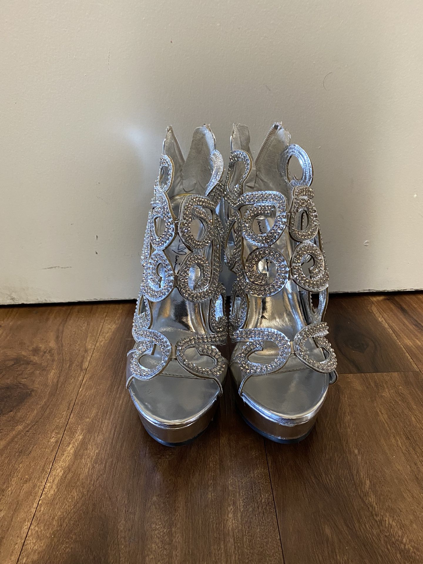 Brand New Woman’s Marichi Mari brand Silver High Heel Shoes Up For Sale 