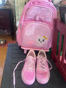 Pink backpack and pink shoes