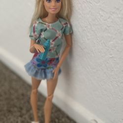 Barbie Doll With Skirt And Flower Shirt With Water Bottle Included With One Accessory