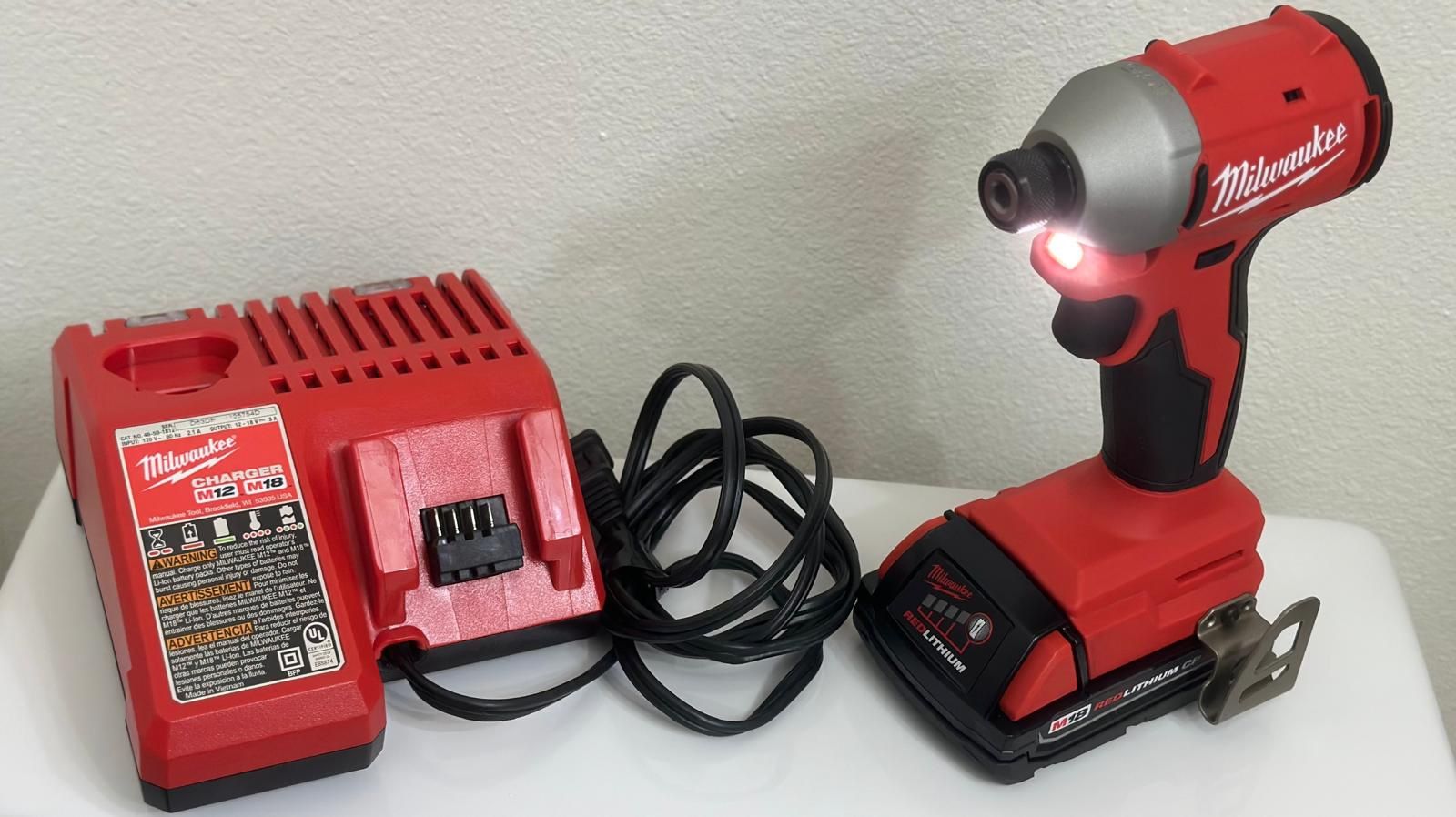 Milwaukee M18 Brushless Impact Driver + Battery + M12/M18 Charger  Negotiable!!