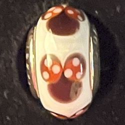 Authentic Pandora Minnie Mouse Glass Bead Charm. $35.00/OBRO