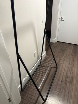 Black Metal Garment Rack with Bottom Shelf