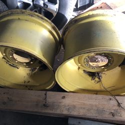 Tractor loader Wheel rims 8 lug Large 2ea removable center calltxt(contact info removed) Ocoee Fl