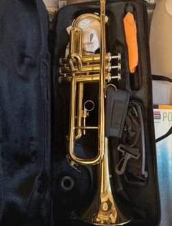Trumpet with case and books