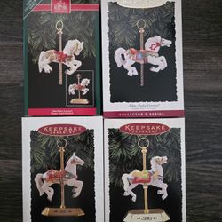 Hallmark Ornaments 1 through 4 in Series by Fobin Fraley Carousel with stands