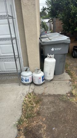 3 propane tank , one is big one