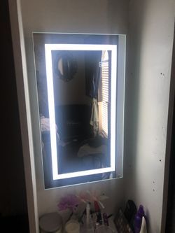Mirror with led light and jewelry storage