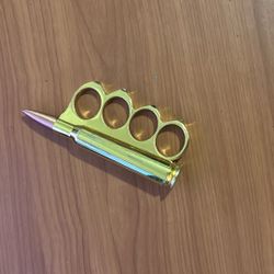 50 CALIBER BULLET KNUCKLES PAPER WEIGHT W/ HIDDEN STASH