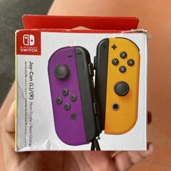 Nintendo Switch Joycons Orange And Purple Brand New