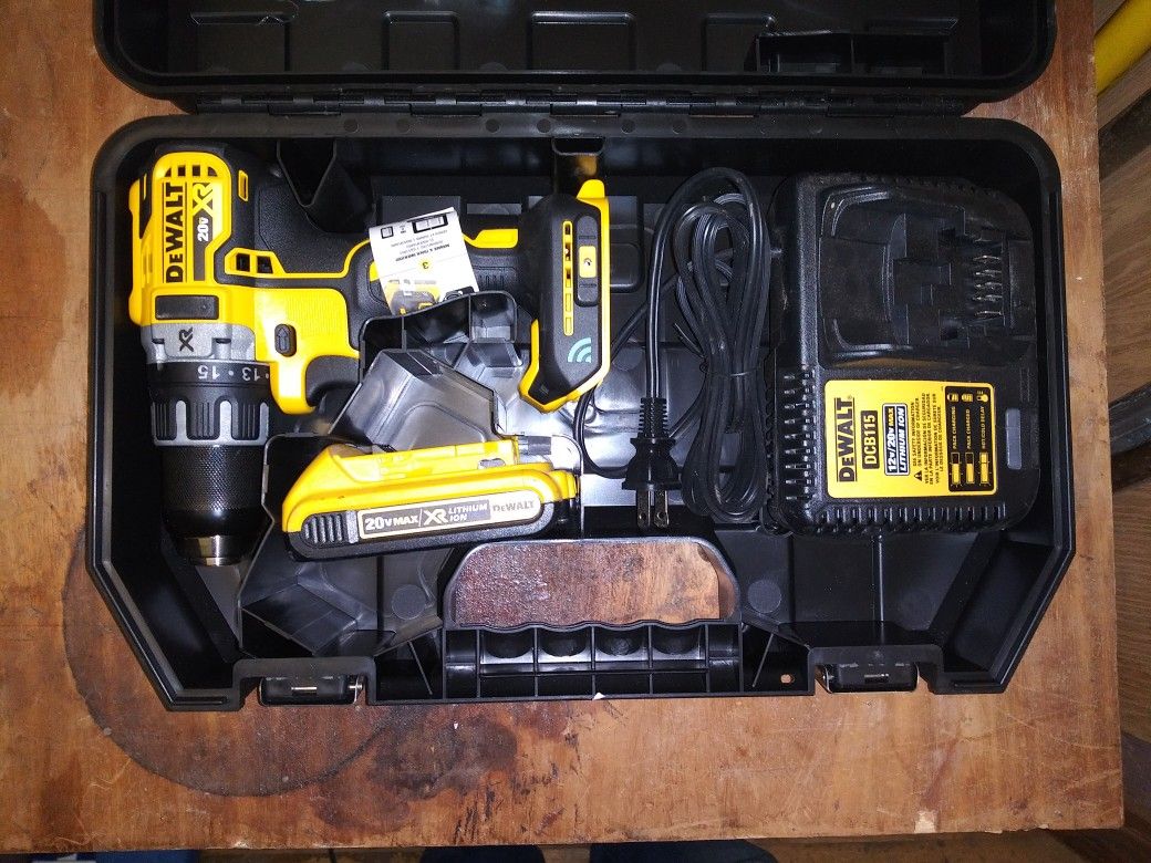 (New) Dewalt 20 volt Bluetooth drill, new battery, and charger.