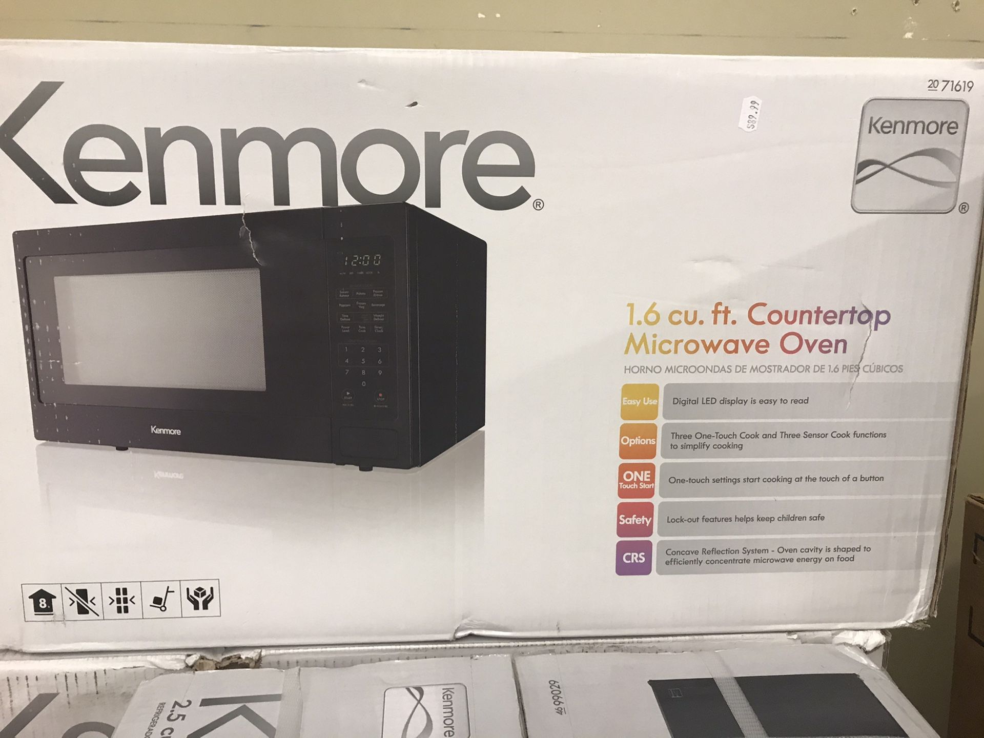 Kenmore 1.6 ft.³ countertop microwave oven digital display one touch start with blackout futures helps keep children safe black