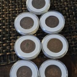 7 INDIAN HEAD PENNIES 