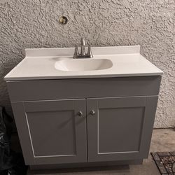 Used bathroom cabinet and sink