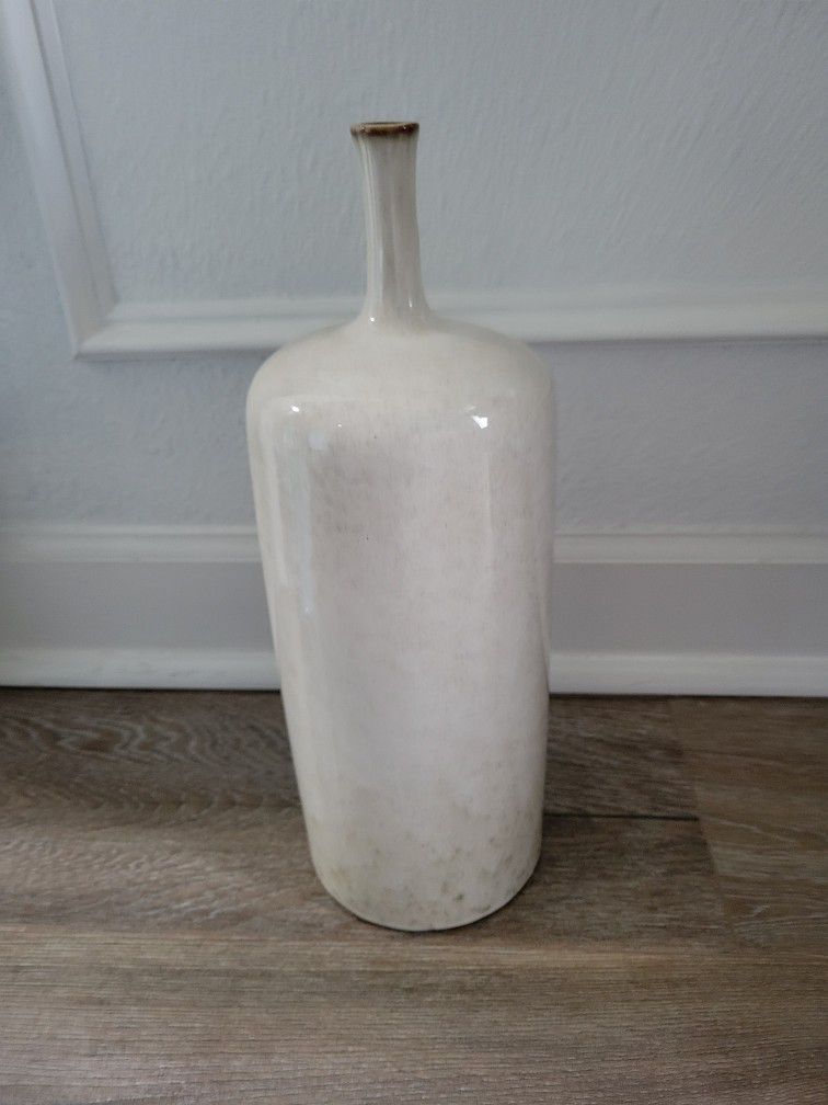 A White Vase That's About 14 Inches Tall 