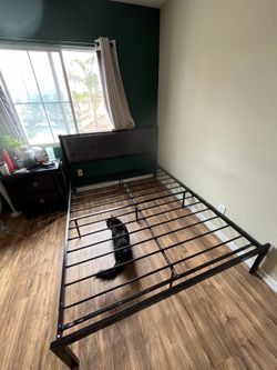 Queen size metal bed frame with head board. Dissasembled