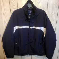 Men’s Gap size XL navy blue and white heavy coat with an inside pocket and fleece lining. There’s some fuzzies on the lining that I haven’t tried to