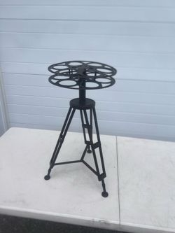 Accent Table Round Metal Tripod Glass Top Industrial Film Reel Home Theater 25"H. Does not have the glass top. Location below  31705 Wesley Chapel blv