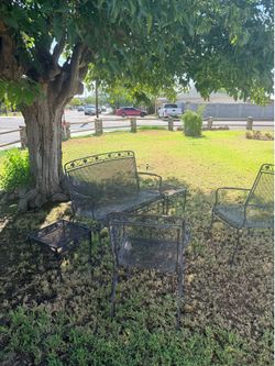 5-piece iron patio or garden set in good condition.