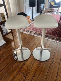 Pair of CB2 Modern Adjustable White Barstools